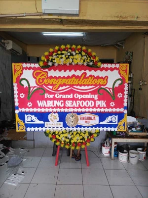 Papan Bunga di Bambu Apus