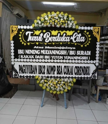 Papan Bunga di Bambu Apus